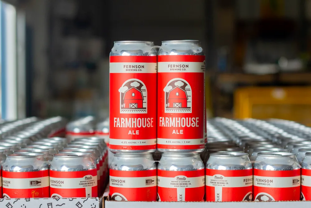 Cases of Farmhouse Ale stacked at the brewery